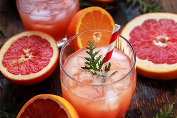 Glass of refreshing alcohol drink with orange juice, vodka or white rum served with ice orange...