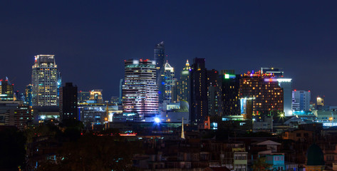 Fototapeta na wymiar Panorama high building in city in night time