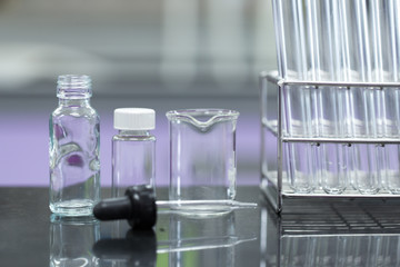Backgrounds of Science research with glassware for laboratory testing.