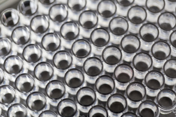 Backgrounds of Science research with 96 wells microplate for laboratory testing.