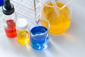 Backgrounds of Science research with glassware for laboratory testing.