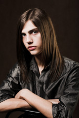 young man with long hair