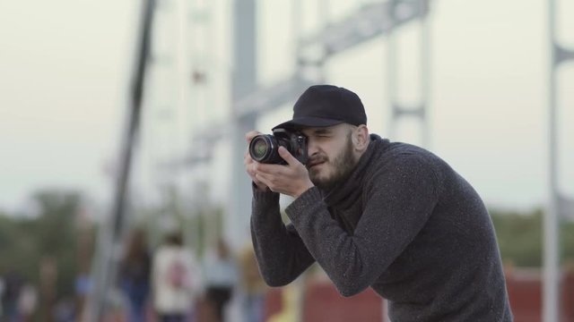Man makes photos at the bridge