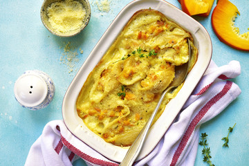 Pasta baked with pumpkin and ricotta in a cream sauce.Top view.