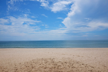 Beach and blue ocean and clear blue sky in Thailan