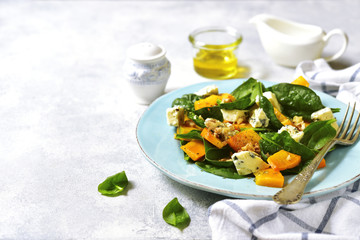 Pumpkin salad with spinach,blue cheese and nuts.