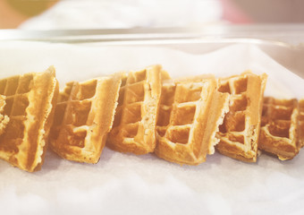Variety kind of waffles in tray.