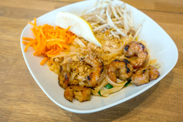 Bowls of Asian noodles and vegetables