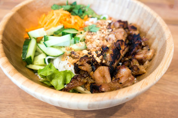 Bowls of Asian noodles and vegetables