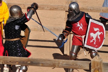 Combate de caballeros medievales