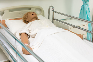 Model of patient on the bed in hospital