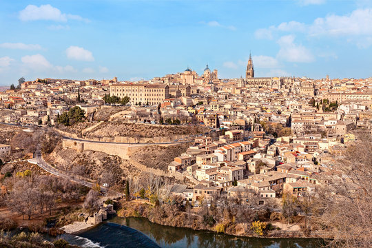Top view of old medieval Toledo from hill in winter sunny day. Spain.