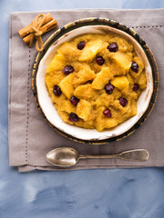 Amaranth porridge with apples, cinnamon, turmeric and dried fruit. Gluten free breakfast meal