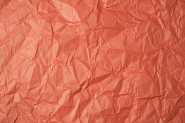 Crumpled orange paper texture