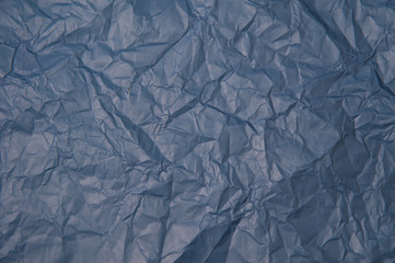 Crumpled blue paper texture