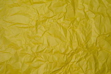 Crumpled yellow paper texture