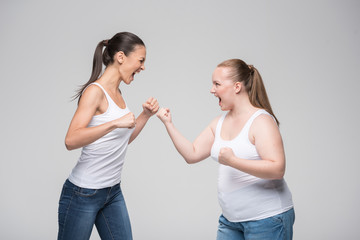 Two women fighting