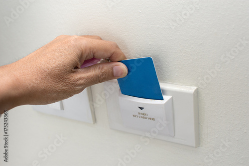 Asian Man Hand Hold Card For Door Access Control Scanning
