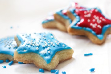 Decorated frosted Christmas Cookies on white background, selective focus