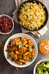 Spicy sweet and sour chicken with rice and cabbage