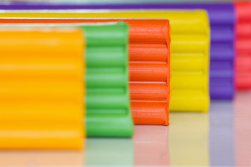 Colorful plasticine sticks. Selective focus