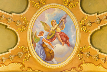 TURIN, ITALY - MARCH 13, 2017: The fresco of angels with the music instruments in  Church Chiesa di...