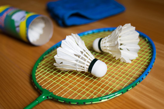Close up shuttlecocks on racket badmintons at badminton courts