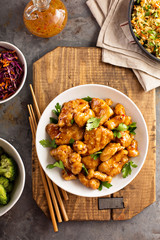 Spicy sweet and sour chicken with rice and cabbage