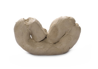 Grey modelling clay block isolated on white background