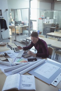 Attentive architect working table