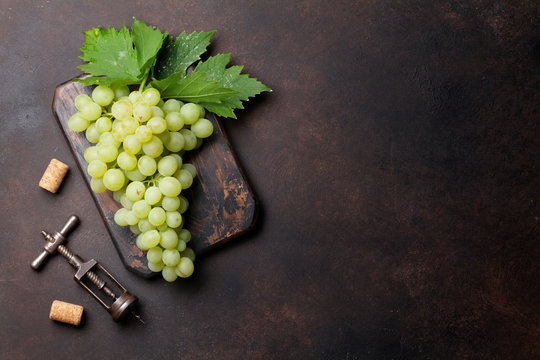 Grapes on stone background