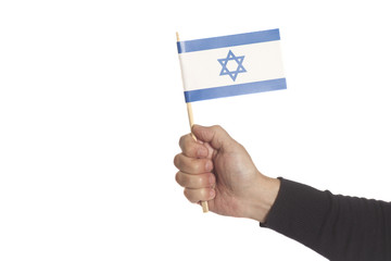 Hand holding Israel flag