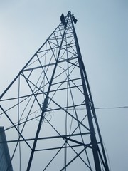Upwards perspective view of an old windmill structure