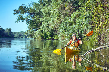 A canoe trip on the river in the summer.
