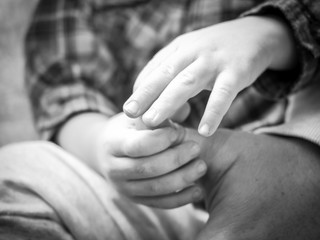 Hands: Child and Father, Black-and-White