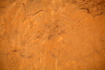 Brown clay mortar on a wall