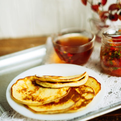 Pancakes with berries and sugar