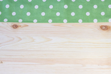 Wooden table covered with a tablecloth Village. Rustic style. Horizontal.