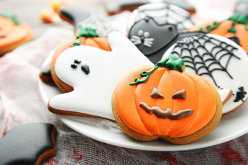 Halloween gingerbread cookies in white plate