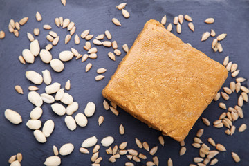 Tasty brown halva on cutting board