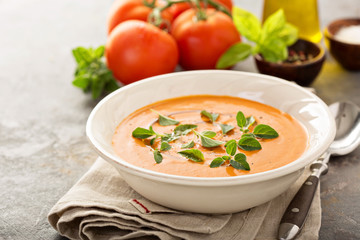 Tomato soup with olive oil and herbs