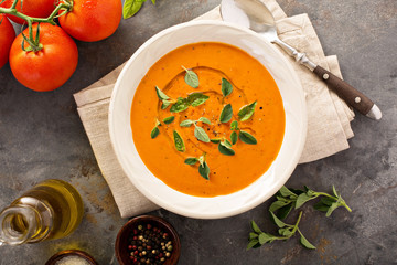 Tomato soup with olive oil and herbs