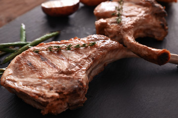 Delicious ribs on slate plate