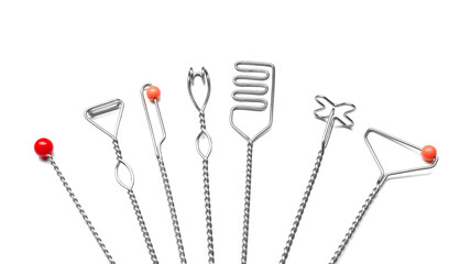 Set of instruments for speech therapist on white background