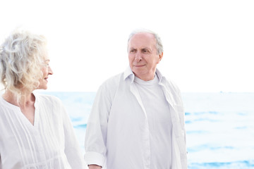 Happy senior couple at sea