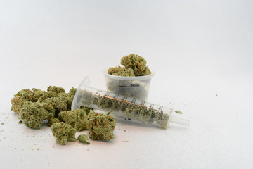 Medical marijuana with medical tools, jar, and pipe