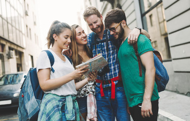Happy tourists travelling and sightseeing