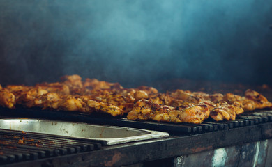 Meat grilled outdoors on a picnic