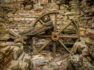 Fototapeta na wymiar Broken Mill Wheel in Abandoned Grist Mill, Virginia