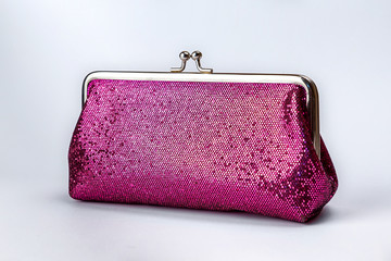 A beautiful pink cosmetic bag on a white background